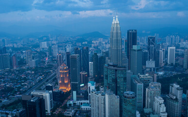 Kuala Lumpur City Skyscrapers view after sunset with Petronas towers in view