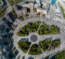 Spring city aerial look down, Freedom Svobody Square central fountain circle. Recreation park in center of Kharkiv, Ukraine