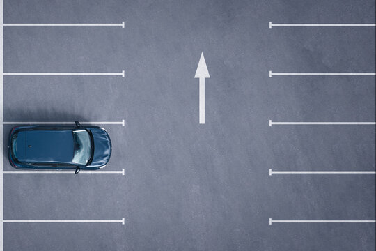samoch&oacute;d parkujący widziany z drona - car parking by drone, from drone