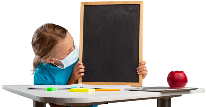 Happy cheerful school child with an empty blackboard.