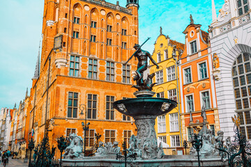 Neptune's Fountain, a famous historical landmark and colorful gothic houses in Gdansk, Poland, Europe. High quality photo © Shi 