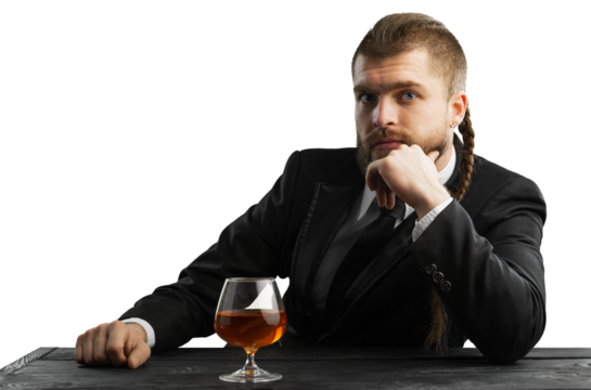 Pensive hipster male with stylish beard and hair in the suit
