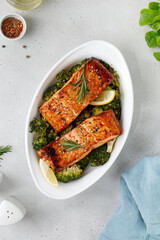Salmon. Baked, roasted fish steaks, slices. Grilled salmon,trout fillet fish in marinade with...