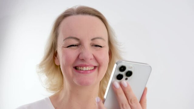 Woman, comic and phone social media in office scrolling while laughing at funny online meme Happy, humor and laughter of marketing girl on smartphone break reading fake news in workspace