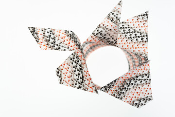 3d object with frottage technique featuring a grid or net pattern on tracing paper and photographed...