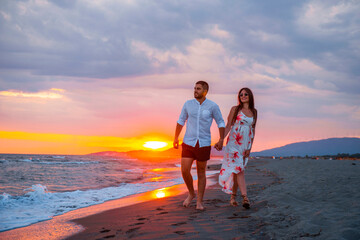 Sunset Stroll: A Couple's Romantic Walk on the Beach