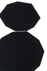 two large cut black paper polygon forms on white