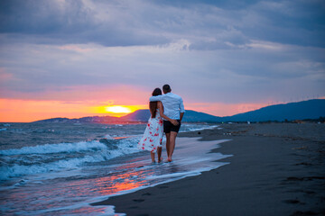 Sunset Stroll: A Couple's Romantic Walk on the Beach