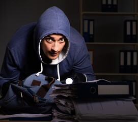 Thief trying to steal personal data in identity theft concept