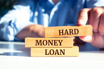 Wooden blocks with words 'Hard money loan'. Business concept