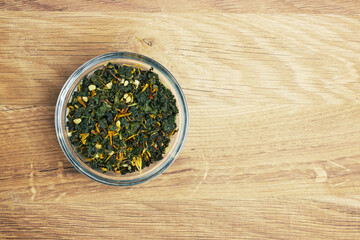 Tea in a bowl on a wood