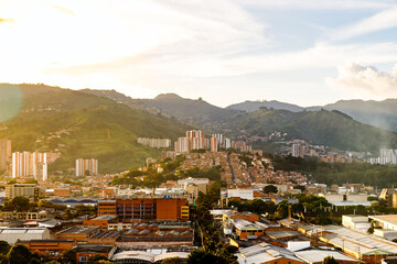 Panoramic of Medellin (Colombia) during sunset with houses on the slopes of the hills