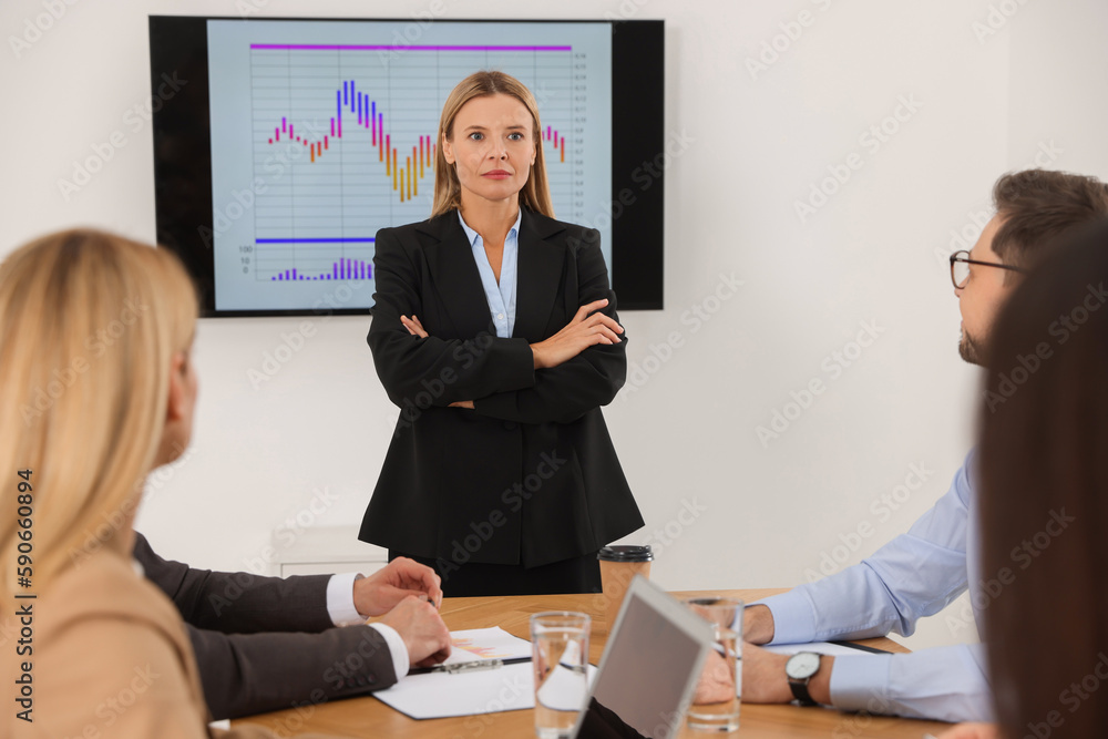 Sticker Businesswoman having meeting with her employees in office