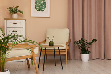 Stylish living room interior with comfortable furniture and beautiful window curtains