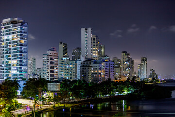Panoramic night view of buildings with port in the background in Cartagena de Indias, Colombia