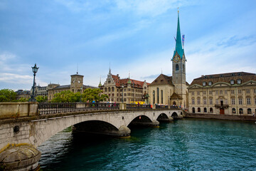Zurich, Switzerland. View of the historic city center with famous Fraumunster Church, on the Limmat river.