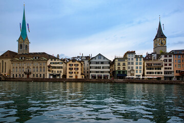 Zurich, Switzerland. View of the historic city center with famous Fraumunster Church, on the Limmat...
