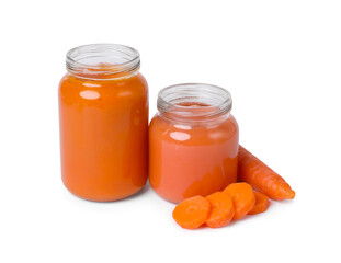 Fototapeta na wymiar Jars of healthy baby food and carrot slices on white background