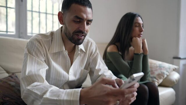 Arab couple faces crisis as boyfriend prioritizes smartphone over girlfriend's presence. Female partner feeling lonely and neglected despite being together