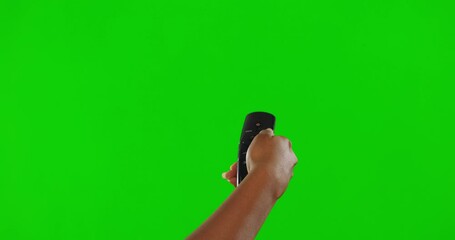 Hand, remote control and green screen, change channel and watching tv with technology and entertainment. Device, digital and person with streaming option, subscription and mockup on studio background