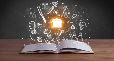 Open recipe book with food related icons above