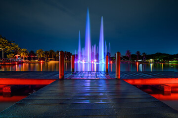 colorful musical fountain on a lake at night at Laman Budaya Shah Alam, Selangor, Malaysia