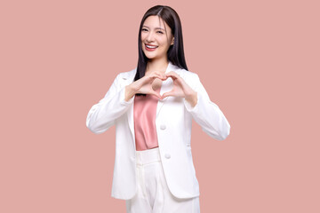 Beauty Asian woman making heart shape hand sign isolated on pink background.