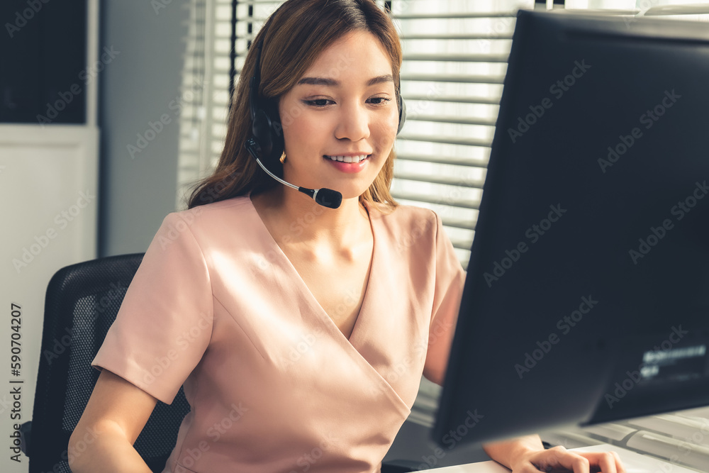 Aufkleber competent female operator working on computer and while talking with clients. concept relevant to bo