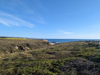 Fototapeta na wymiar Half Moon Bay rocky shore, Pacific Ocean beach view, San Francisco coastline, California cliffed coast, abrasion coast