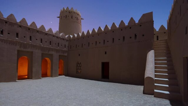 Mezairaa Fort at night sky start time lapse. Fort in Liwa city, Abu Dhabi.