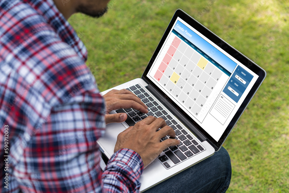 Poster calendar on computer software application for modish schedule planning for personal organizer and on