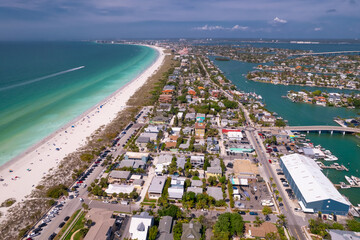 Florida St. Pete Beach. Summer vacations. Ocean beach, Hotels and Resorts in US. Blue-turquoise color of salt water. American Coast or shore line in Gulf of Mexico. St Petersburg Clearwater Florida.