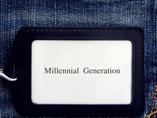An office / corporate ID card on denim jeans background with text Millennial Generation, ...