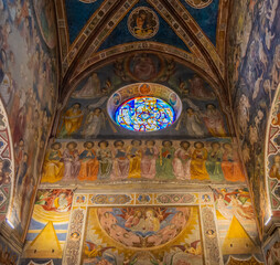 Fototapeta na wymiar Collegiate Church of Santa Maria Assunta, San Gimignano - sculptures and frescoes inside the church . Province of Siena, Tuscany, Italy, Europe - June 2, 2021