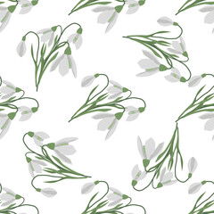 Seamless pattern with spring flowers and snowdrops. Isolated on white background. Vector illustration.