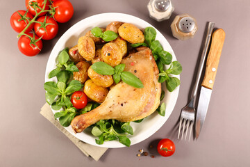 grilled chicken leg with roasted potatoes