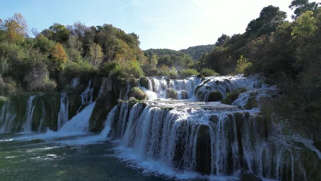 Skradinski buk with its beautiful waterfalls and blue pools in Krka National Park. Drone video of the large series of cascades rising up.