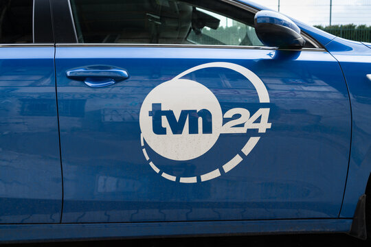 TVN24 TV network company logo on the car door. Polish 24-hour commercial news channel. TVN 24 television station, information media on March 24, 2023 in Warsaw, Poland.