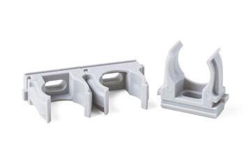 Plastic clips for laying pipes