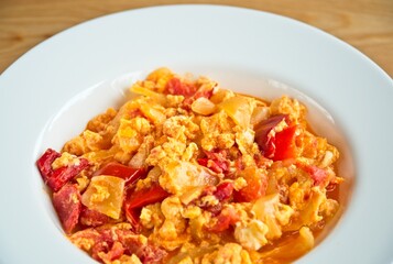 Close up of a typical hungarian homemade lecso (in hungarian: lecsó) from tomatoes, peppers,...