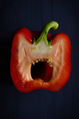 red bell pepper on dark background