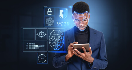 African man with tablet, biometric scanning