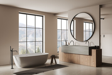 Light bathroom interior with bathtub and sink, mirror and panoramic window