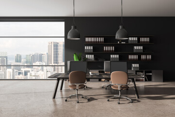 Grey office coworking interior with pc computer on desk, shelf and window