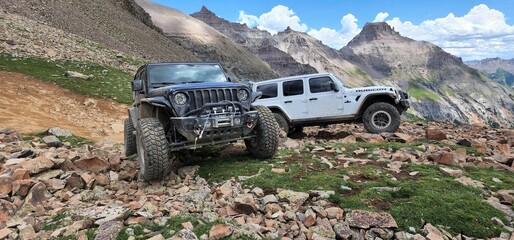 Fototapeta premium Jeep Wrangler Unlimited and Jeep JK cars on Yankee Boy Mine mountains Ouray, Colorado
