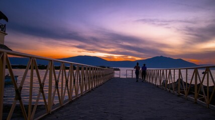 Fototapeta na wymiar Landscape of a pier over Lake Chapala during the sunset in Mexico