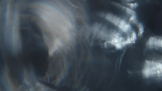 Glowing Blue Bokeh Crystals on Dark Background