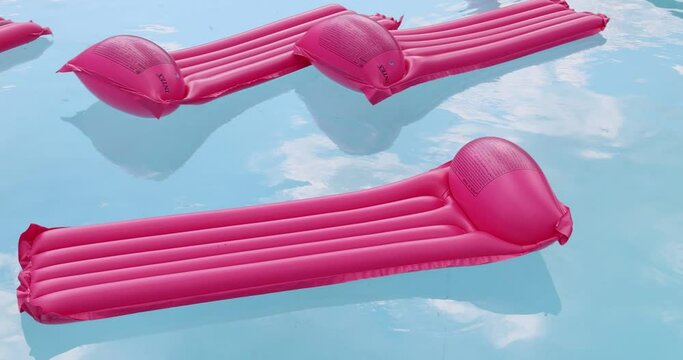 Vacation travel concept with inflatable float toy mattress in luxury swimming