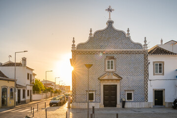Nossa Senhora do Livramento church at sunrise in Tavira town, Algarve region, Portugal.
