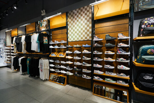 HO CHI MINH CITY, VIETNAM - CIRCA MARCH, 2023: interior shot of Vans retail store in Crescent Mall. Vans is an American manufacturer of skateboarding shoes and related apparel.